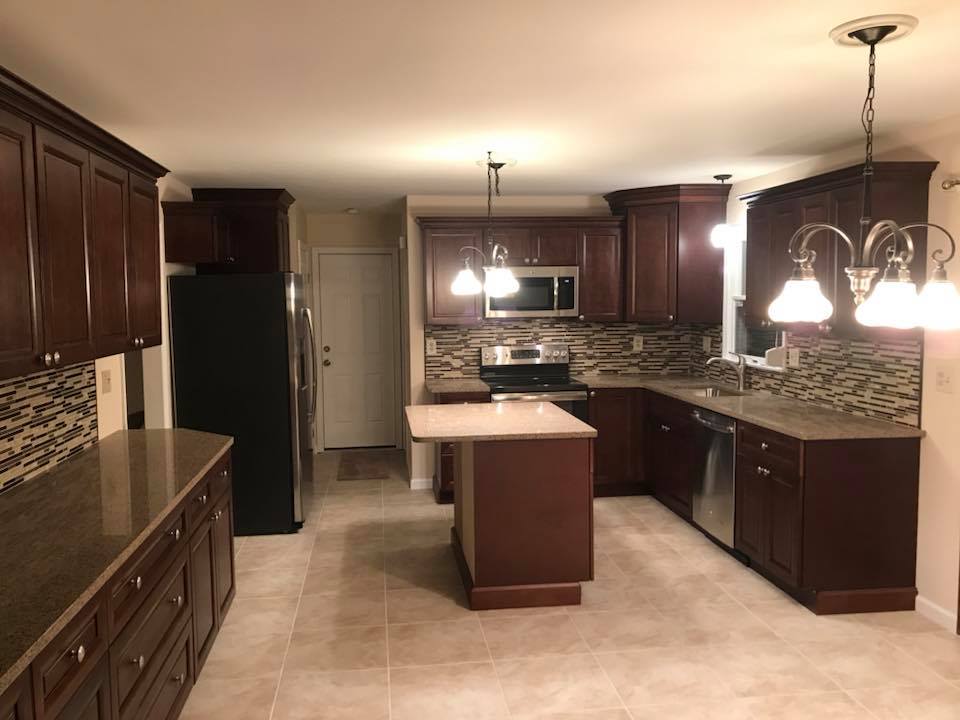 Kitchen Renovation Allentown. A phot of a kitchen remodeled with wood cabinets