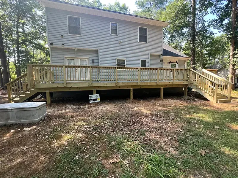 wooden deck leading to backyard