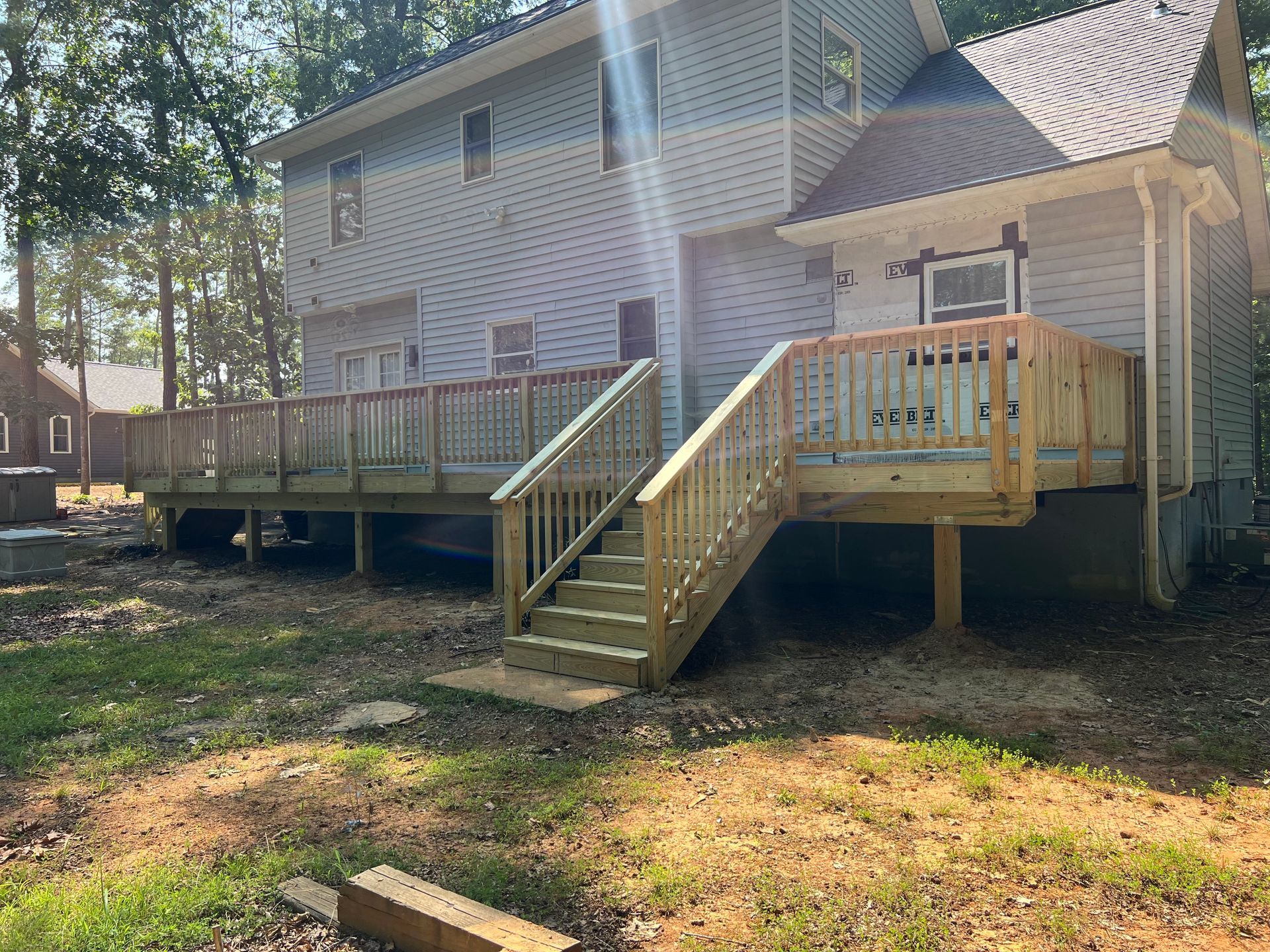 wooden deck leading to backyard
