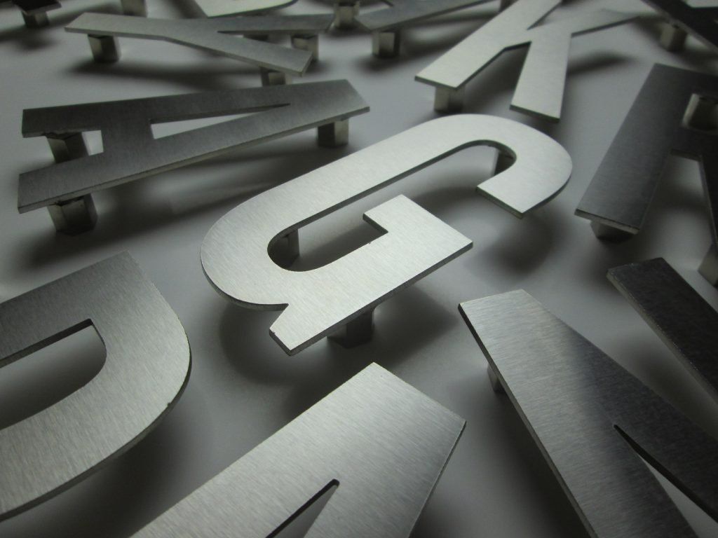 Example Metal Letters Metal letters in your lobby signage.