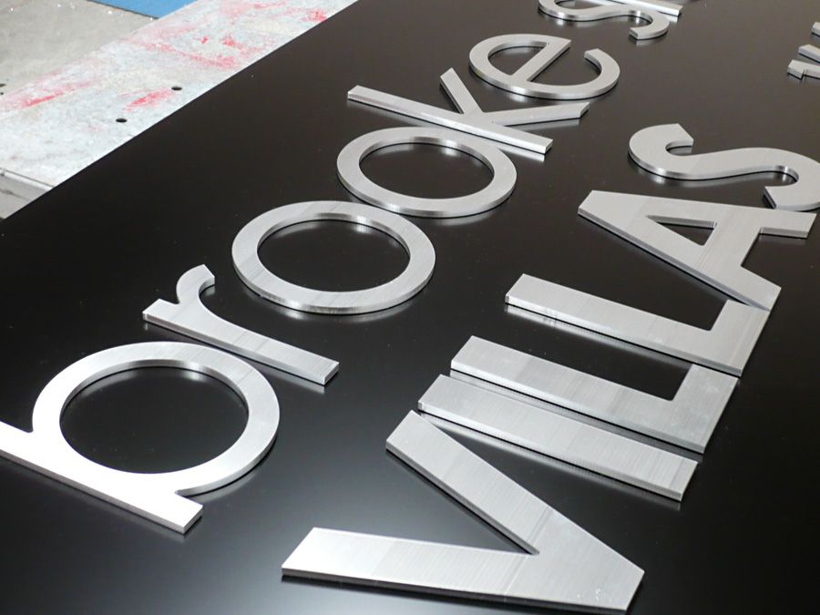 Flat cut metal letters
