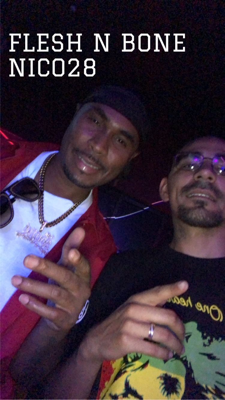 Two men are posing for a picture and the caption says flesh n bone nico28
