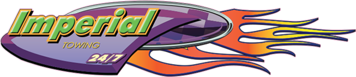 Logo for Imperial Towing, 24/7 service. Features text in green and flames.