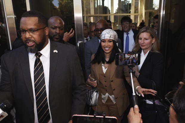 A jury sided with Cardi B on Friday in a copyright infringement case involving a man who claimed the Grammy-winning rapper misused his back tattoos for her sexually suggestive 2016 mixtape cover art.  The federal jury in Southern California ruled Kevin Michael Brophy did not prove Cardi B misappropriated his likeness. After the jury forewoman read the verdict, the rapper hugged her attorneys and appeared joyful.  Cardi B thanked the jurors, admitting she was 