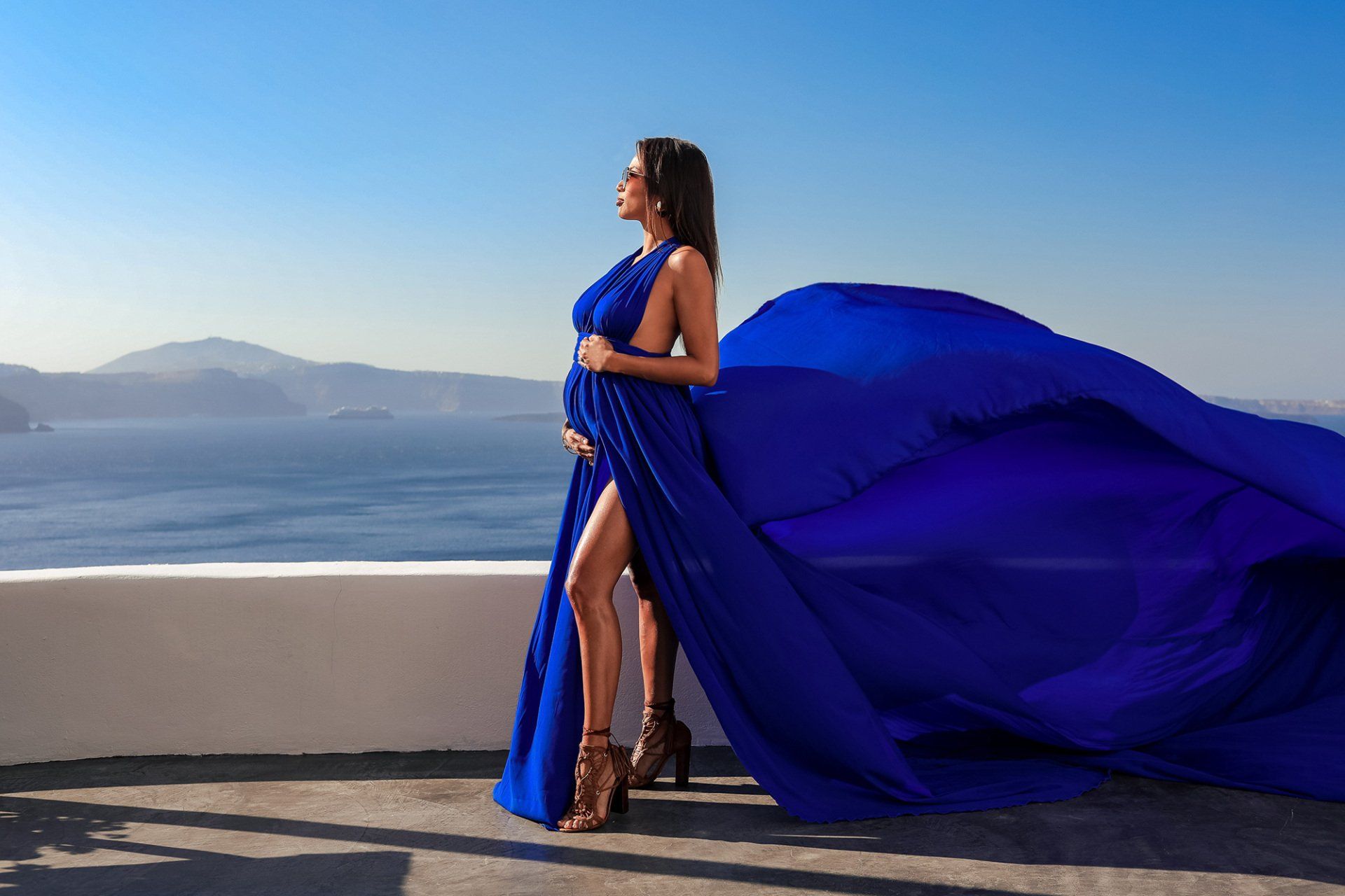 jeannie mai preganant with First child wearing blue halter maxi evening dress