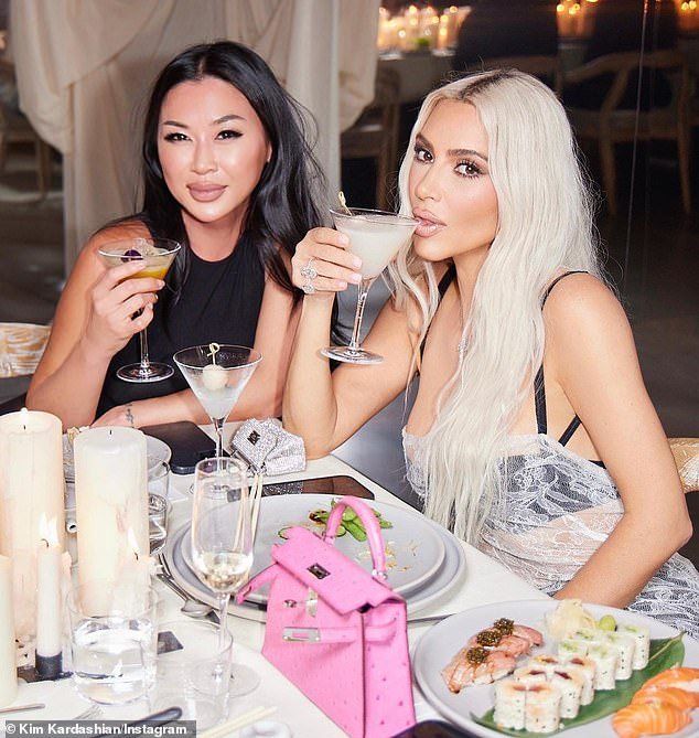 Kim Kardashian gives a peek inside her lavish 42nd birthday party as she shares snaps from bash including one with her famous sisters: 'Birthday love'