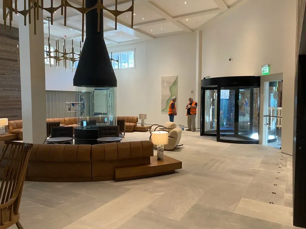 two electrician in a beautiful house