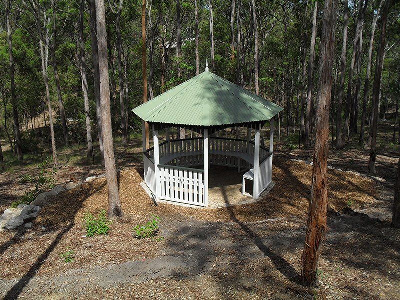 Multisided Colorbond Gazebo in a Forest — Chipping Norton, NSW — Breeze Gazebos & Huts