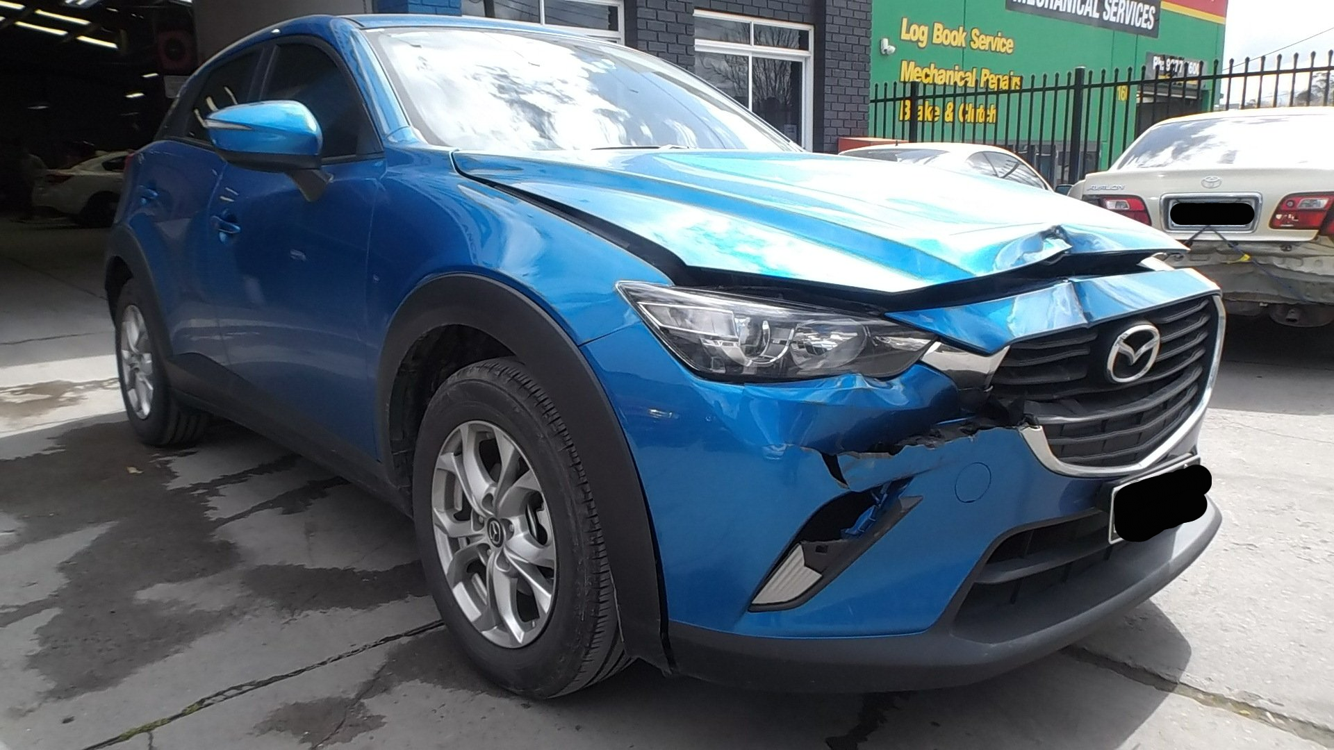 Before Blue Mazda Repair — Melbourne, VIC — Nunawading Panels