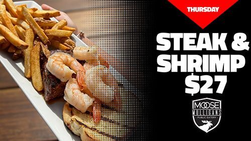 Steak and shrimp plate with fries, advertised for $27 on Thursday.