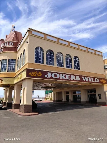 A large building with a sign that says jokers wild