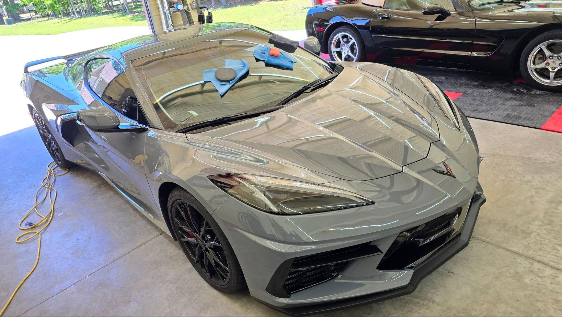 Ceramic coated gray car protected against UV rays and contaminants