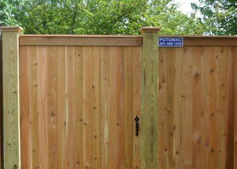 flat board fence with gate - custom fences in Rockville, MD