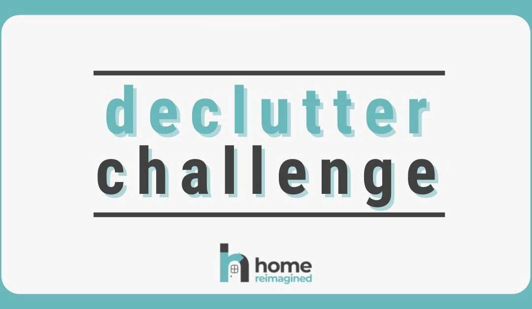 A blue and white sign that says `` declutter challenge ''. A blue and white sign that says `` declutter challenge ''.