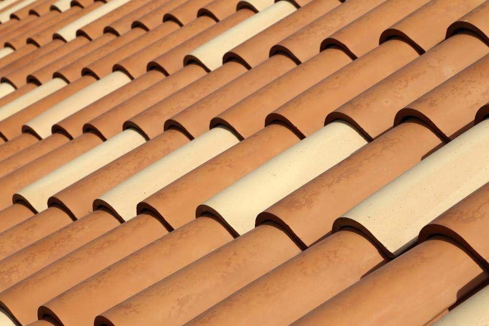 Rows of Terracotta Roof Tiles with Alternating Tan — Goonellabah Roof Tilers In Northern Rivers, NSW