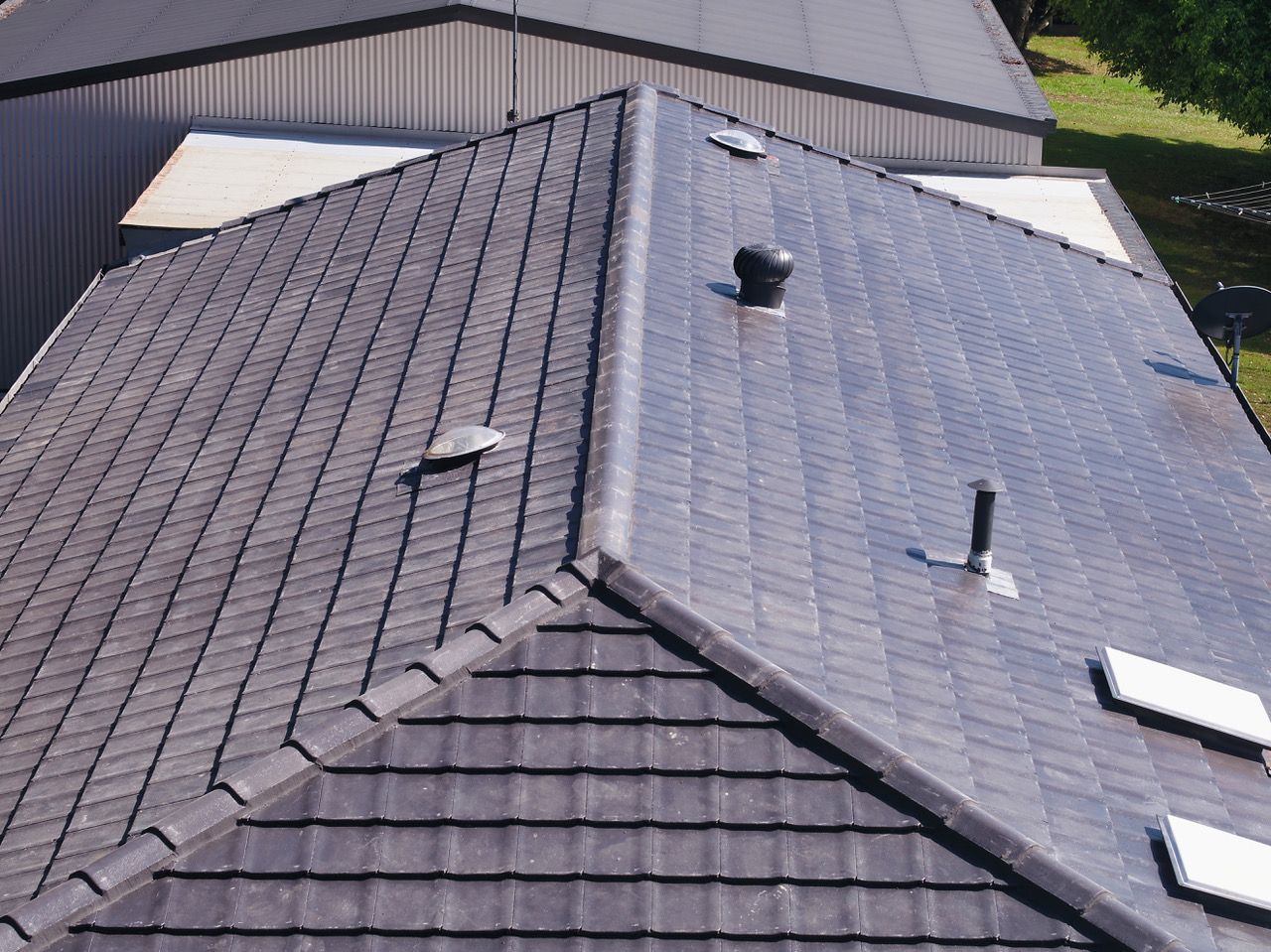Workers Installing Concrete Tiles on the Roof — Goonellabah Roof Tilers In Kyogle, NSW