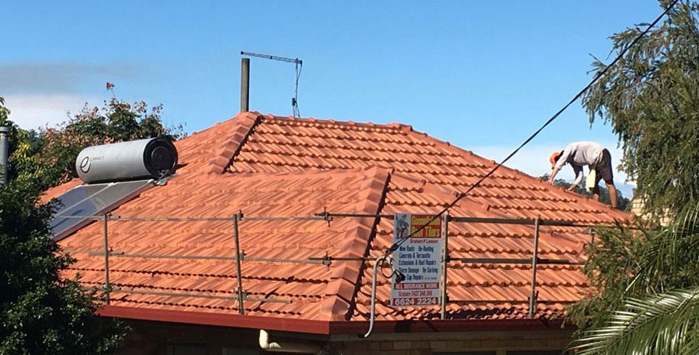 Roofer Working on a Roof — Goonellabah Roof Tilers In Monaltrie, NSW