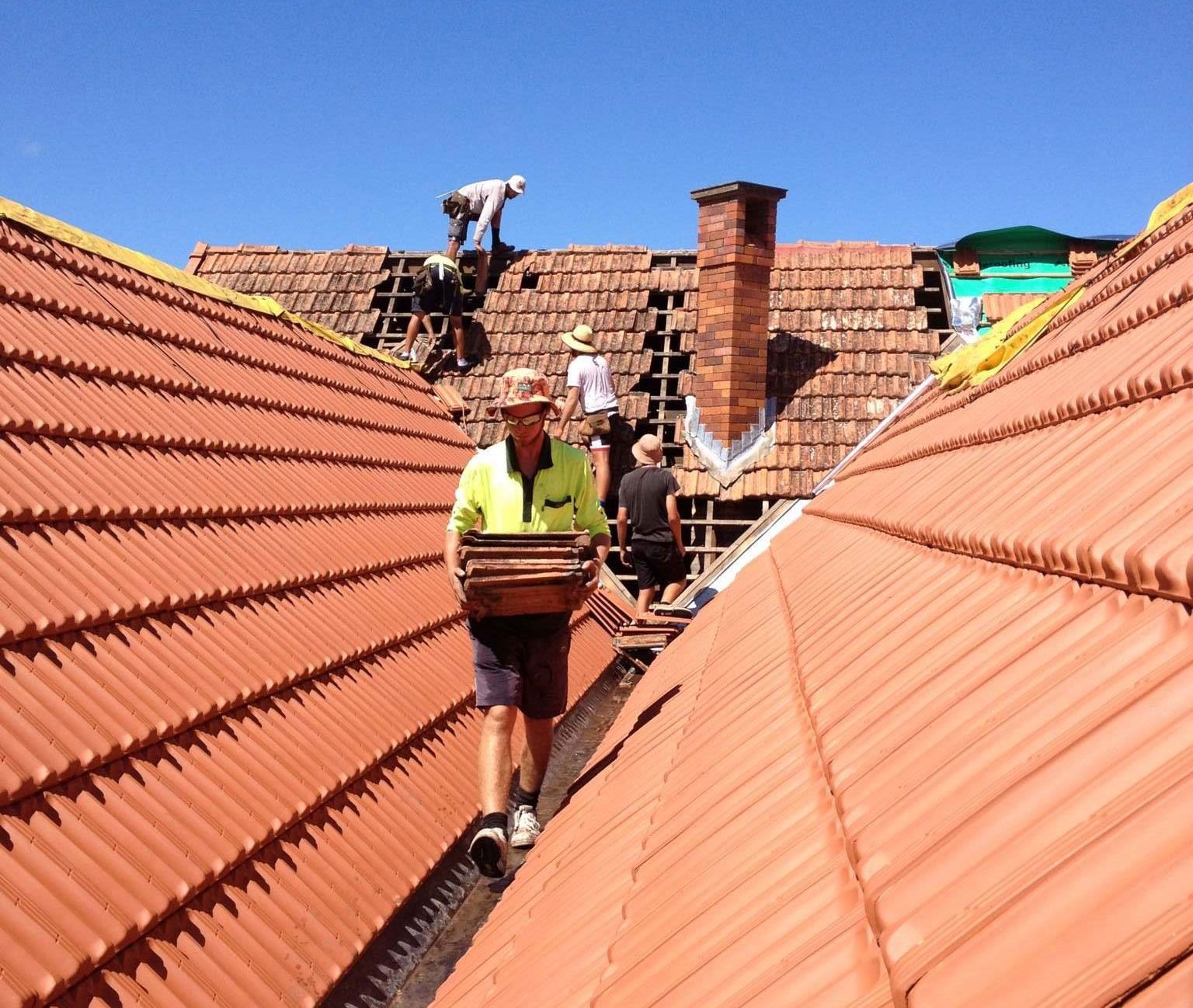 Roofers Working On A Roof In Lismore