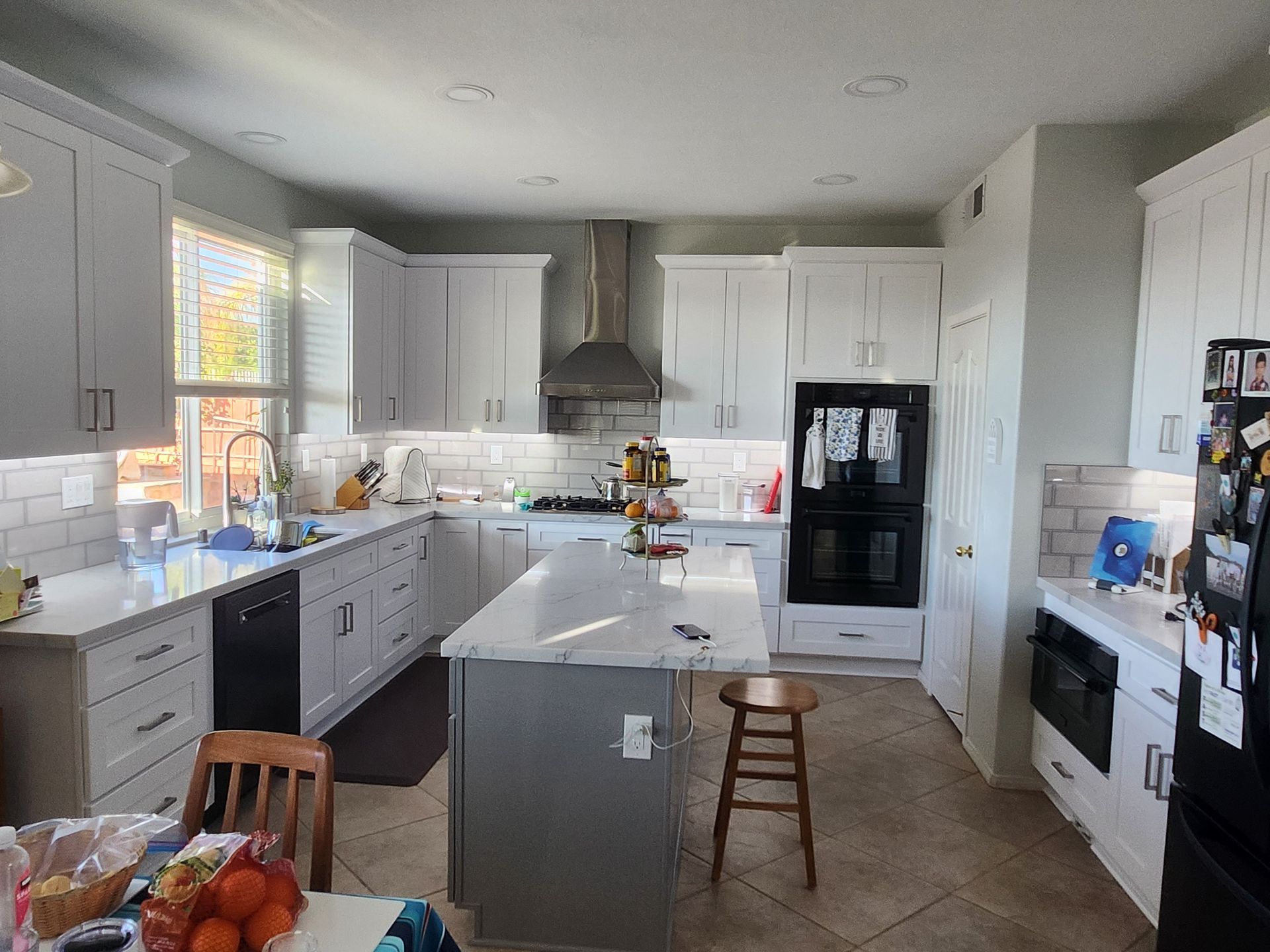 Modern remodeled kitchen by Value Renovation in Temecula, CA, with new cabinets and quartz counters