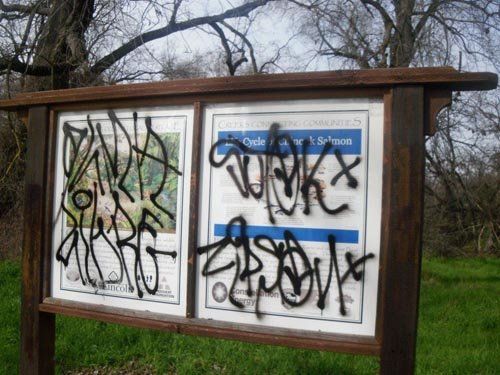 Residential Graffiti Removal — BEFORE - Street Info Post Vandalism in Citrus Heights, CA