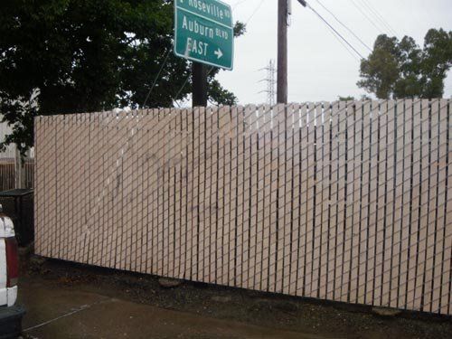 Commercial Steam Cleaning — Power Washed Public Wooden Fence in Citrus Heights, CA