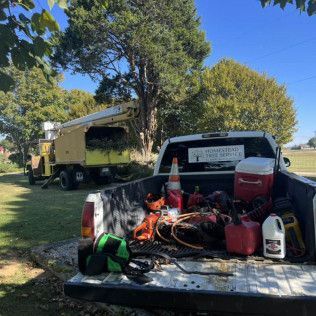 a truck with a lot of tools in the back of it .