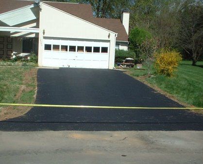 New Driveway with Seal Coat — Asphalt Paving Contractor in Germantown, MD