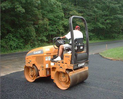 Worker Paving Asphalt — Asphalt Paving Contractor in Germantown, MD