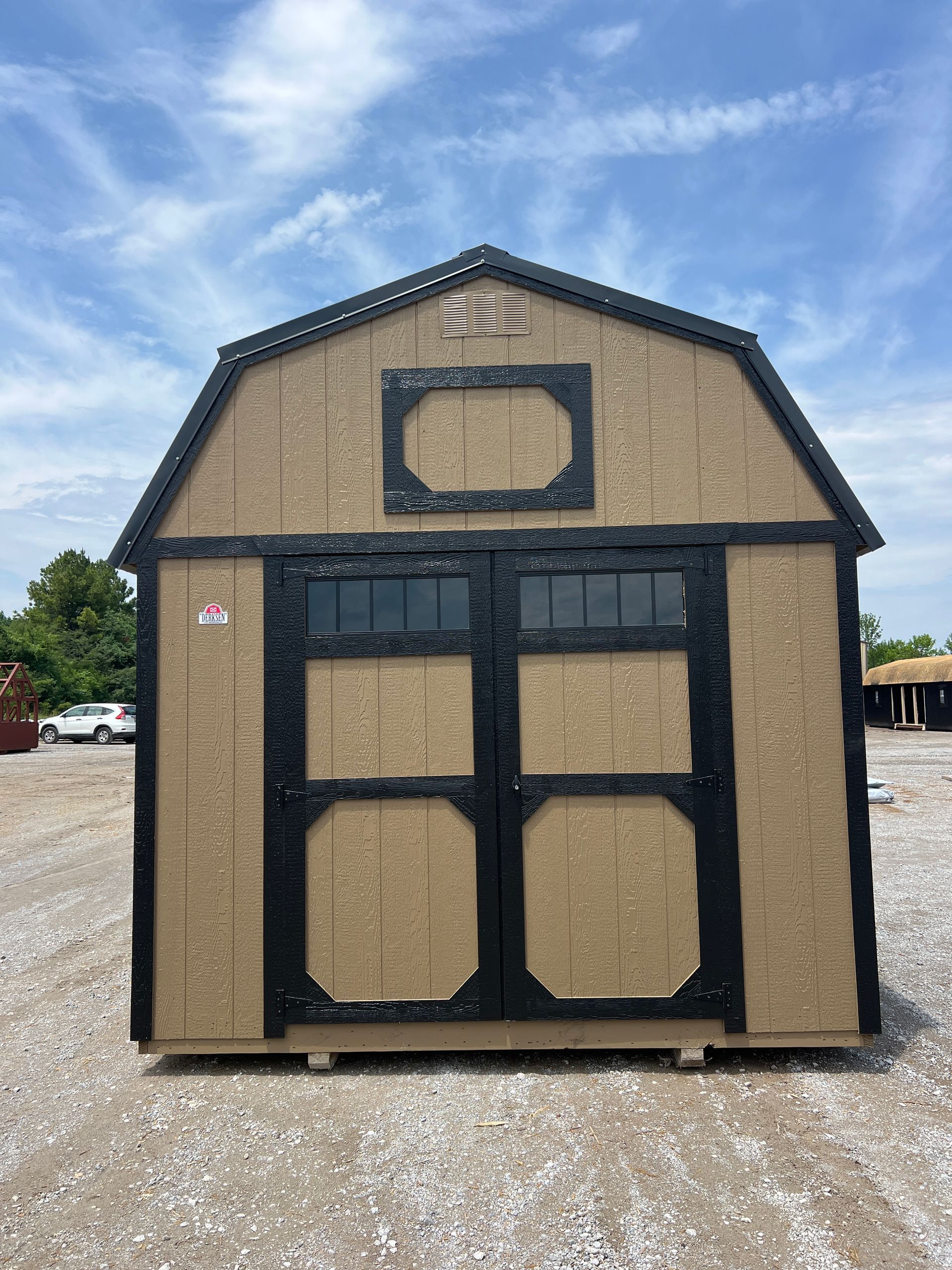 Explore the Derksen 10x16 Lofted Barn with transom windows and a stylish finish. Perfect for storage or a workshop!
