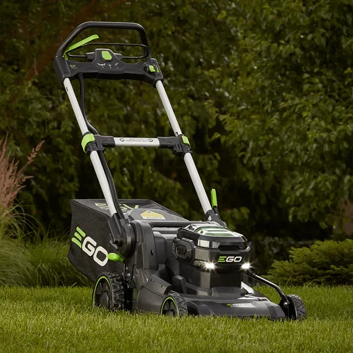 A ego lawn mower is sitting on a white surface.