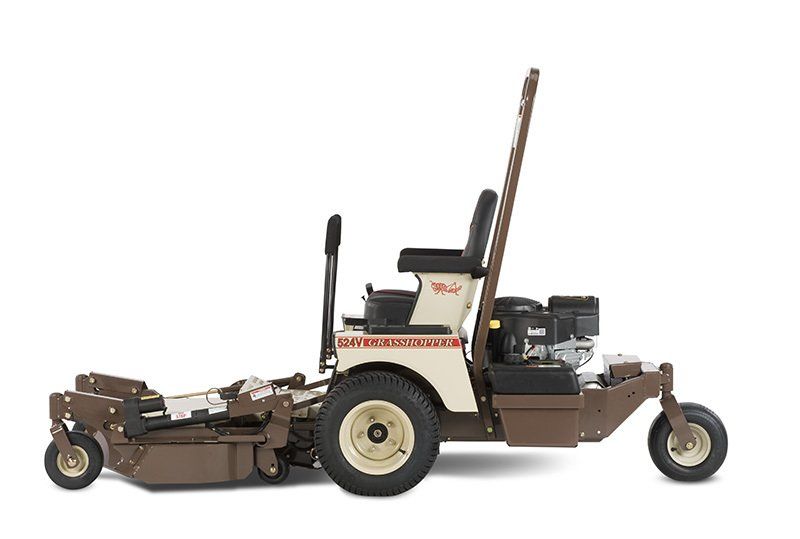a brown and white lawn mower