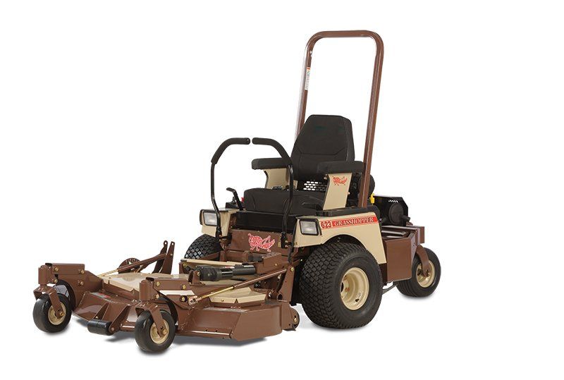 a brown and tan lawn mower with a black seat