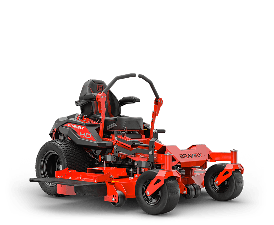 A red and black gravely mower is sitting on a white surface.