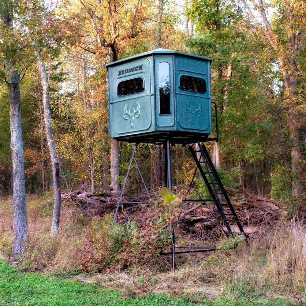 a redneck deer stand in the middle of a forest