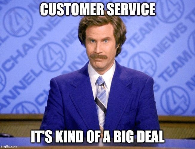 A man in a blue suit and tie says customer service it 's kind of a big deal