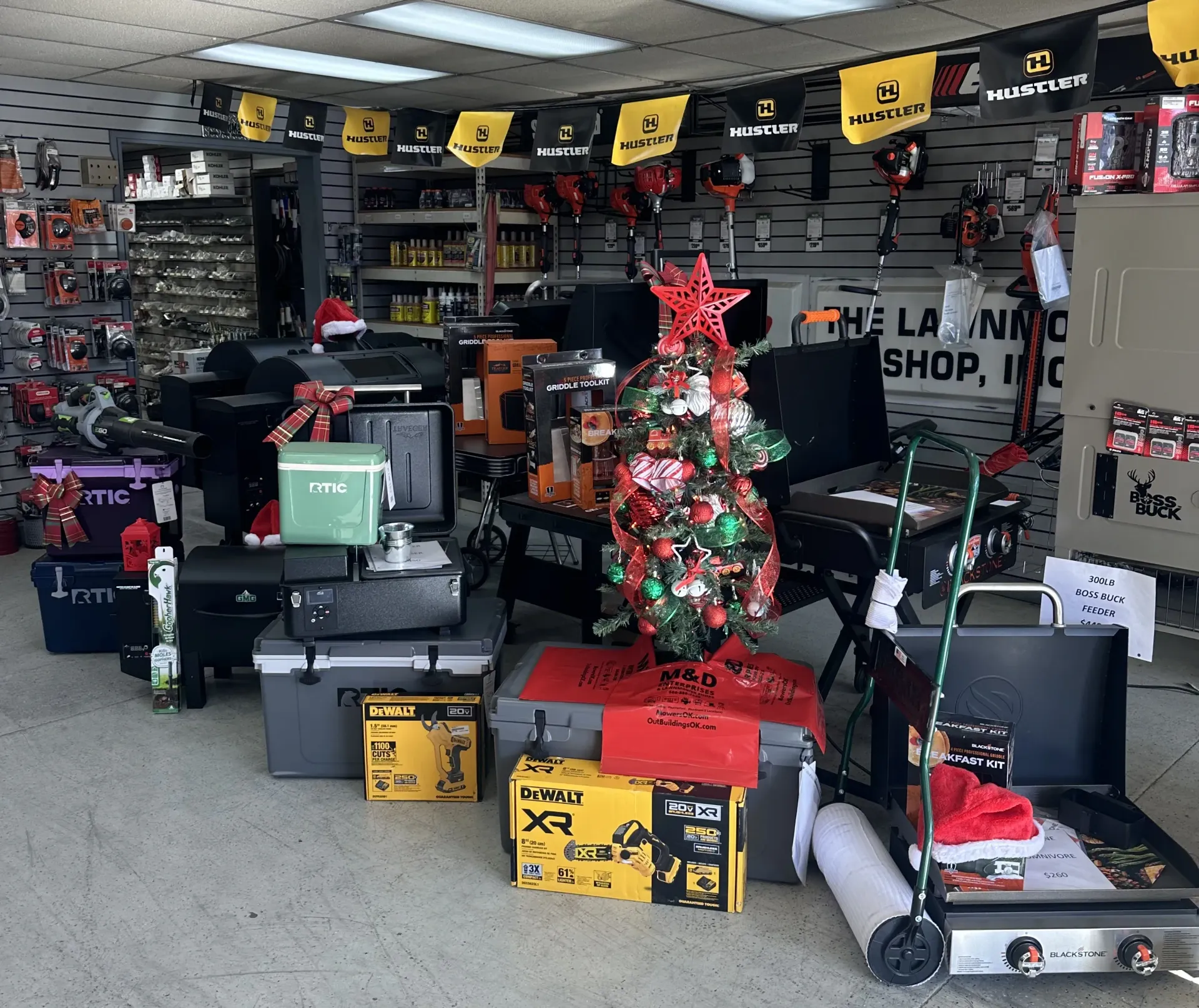 A christmas tree is in the middle of a store