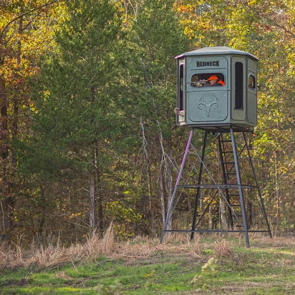 a redneck hunting stand in the middle of a forest