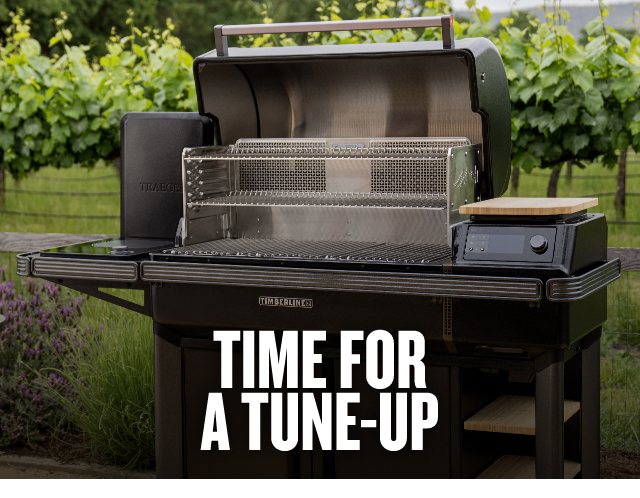 A grill with the words time for a tune-up above it