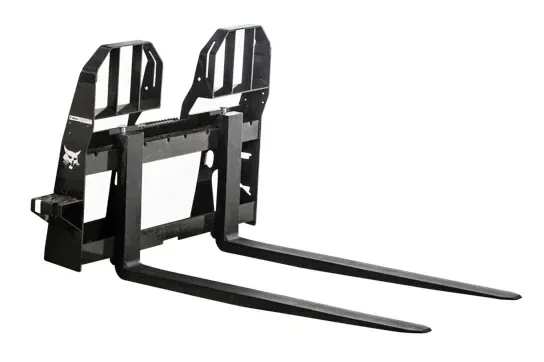 a pair of forks attached to a forklift on a white background .