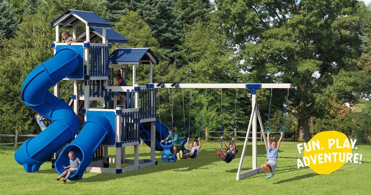 children are playing on a playground with a sign that says fun play adventure