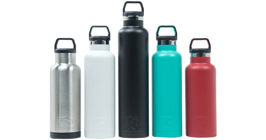 A group of water bottles of different sizes and colors are lined up in a row.