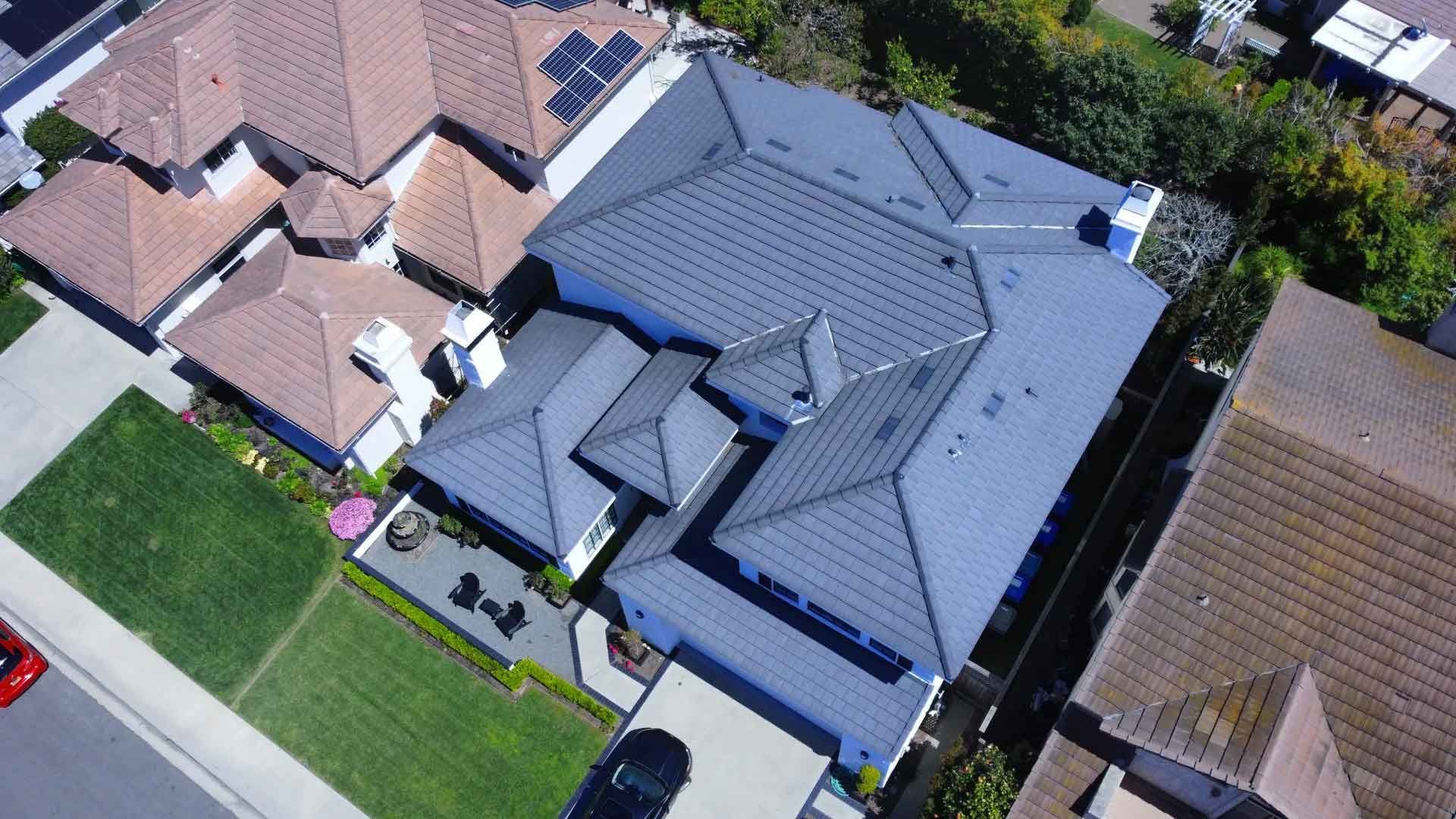 New Flat Concrete Roof Installed By Dana Logsdon Roofing & Solar