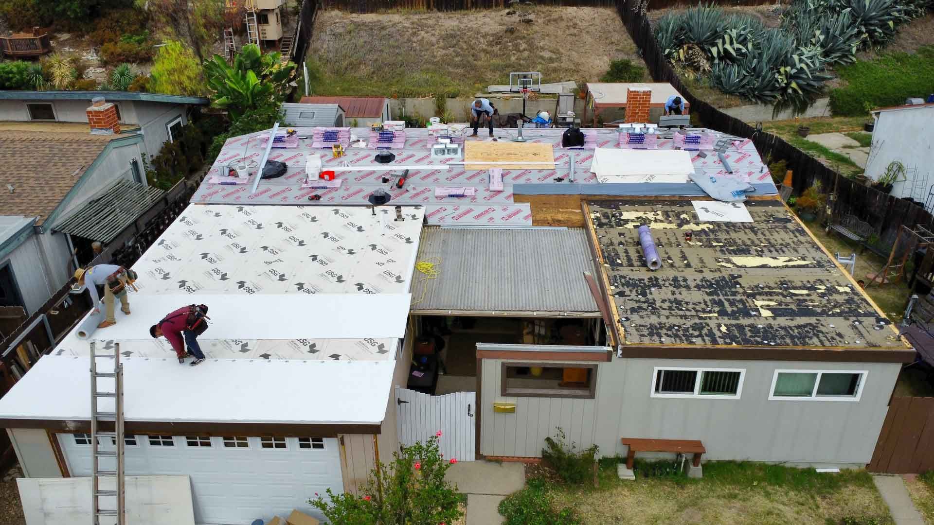 New Shingle And Flat Residential Roof Done By Dana Logsdon Roofing & Solar