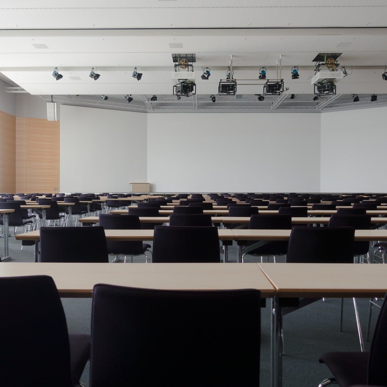 Image of an empty classroom or meeting room with led lighting