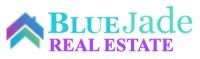 A blue jade real estate logo with a rainbow colored arrow.