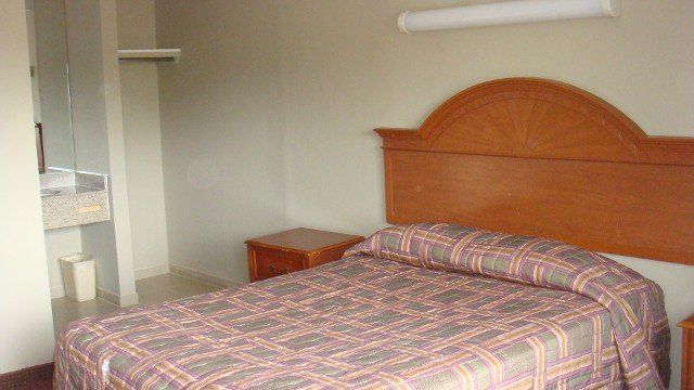 Bedroom — Local Motel in Edison, NJ