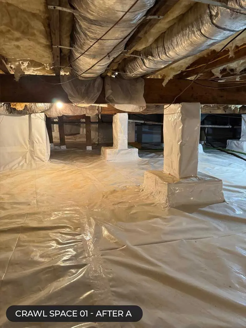 Plastic-covered crawl space with exposed ducts, beams, and support posts under a house