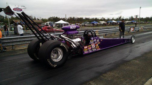 A purple race car with the number 922 on it