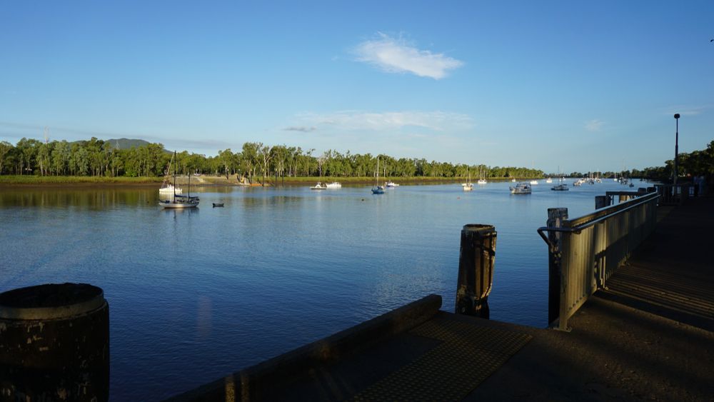 There Are Many Boats In The Water And A Dock In The Foreground — All Hours Vac Truck In Rockhampton, QLD