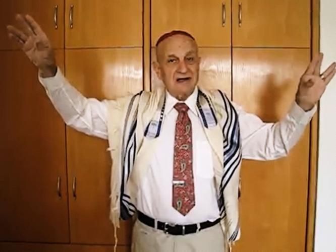 David H. Stern chants the Aaronic Blessing - Screen cap from FB